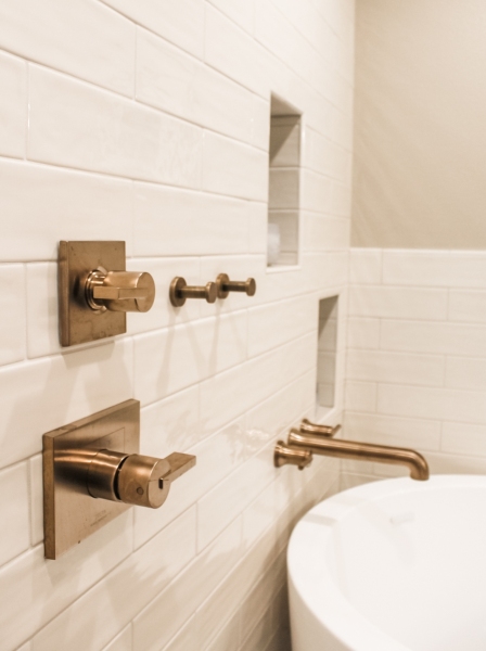 Master-Bathroom-Brushed-Gold-Finishes-Wall-Alcove-Japanese-Soaking-Tub-Cream-Wavy-Subway-Tile-Light-Grout