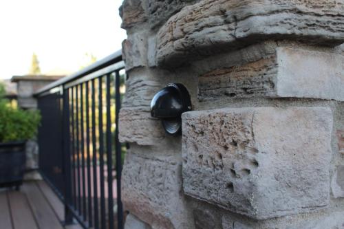 Back-Deck-Timbertech-Azek-Line-Custom-Steel-Railing-Stone-Veneer-Columns-Low-Volt-Lighting-Darian.jpg (1)