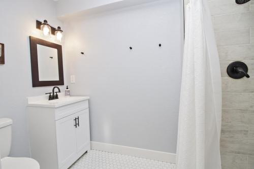 Basement-Bathroom-Wood-Tile-Hex-Tile-Oil-Rubbed-Bronze-War-Eagle (1)