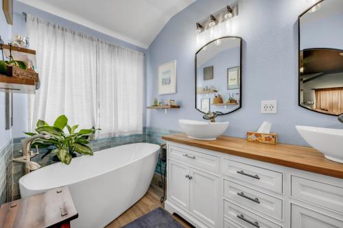 Copy-of-Master-bathroom-soaker-tub-vessel-sinks-double-vanity-blue-wavy-tile-light-grout-floating-shelves-bathtub-butcher-block-countertops-interior-remodeling-Rose-Ridge
