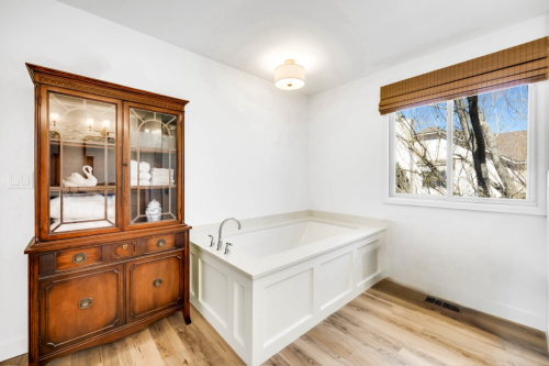 Copy-of-Primary-Bathroom-LVP-Floor-Chrome-Plumbing-Fixtures-Quartz-Drop-in-Bathtub-Steinbeck