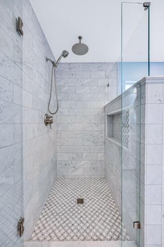 Master-Bathroom-Marble-Shower-Tile-Mosaic-Floor-Tile-Brushed-Nickel-Finishes-Wall-Alcove-with-Accent-Tile-Rain-Shower-Head-Glass-Shower-Door-Pony-Wall-With-Glass-Gilpin