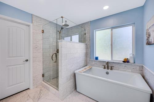 Master-Bathroom-Square-Marble-Floor-Tile-Marble-Subway-Shower-Tile-Mosaic-Floor-Tile-Rain-Shower-Head-Brushed-Nickel-Finishes-Glass-Shower-Door-Pony-Wall-With-Glass-Rectangle-Soaking-Tub-Gilpin