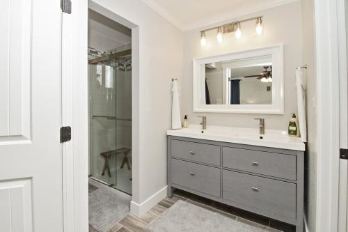 Master-Bathroom-Wood-Look-Tile-Floor-Large-Format-Tile-Shower-Brushed-Nickel-Finishes-Accent-Tile-Light-Grout-War-Eagle